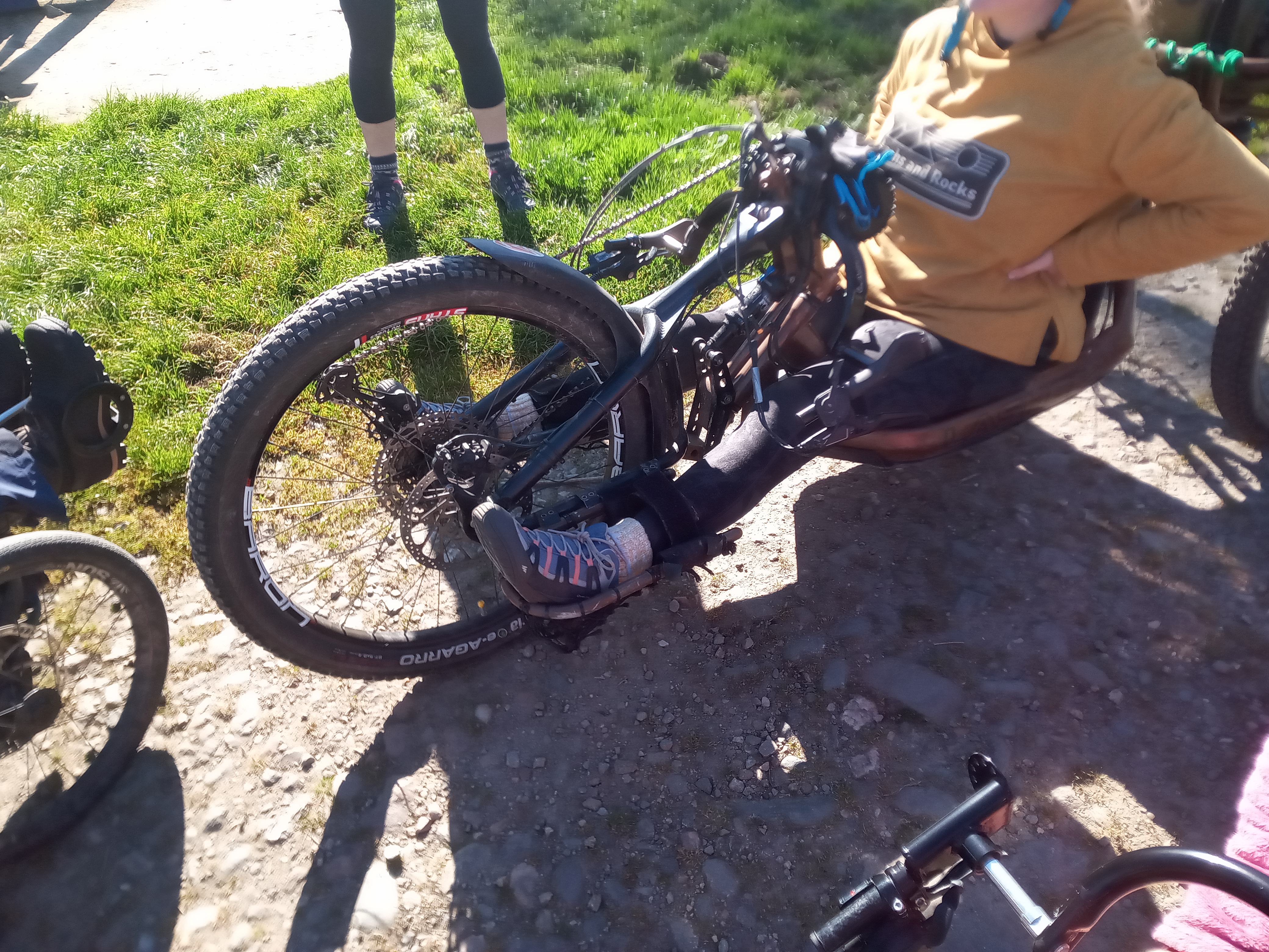 Handcycle steering detail. The actual steering axis is the head tube, which is the lowest of the tubes visible below the fork.